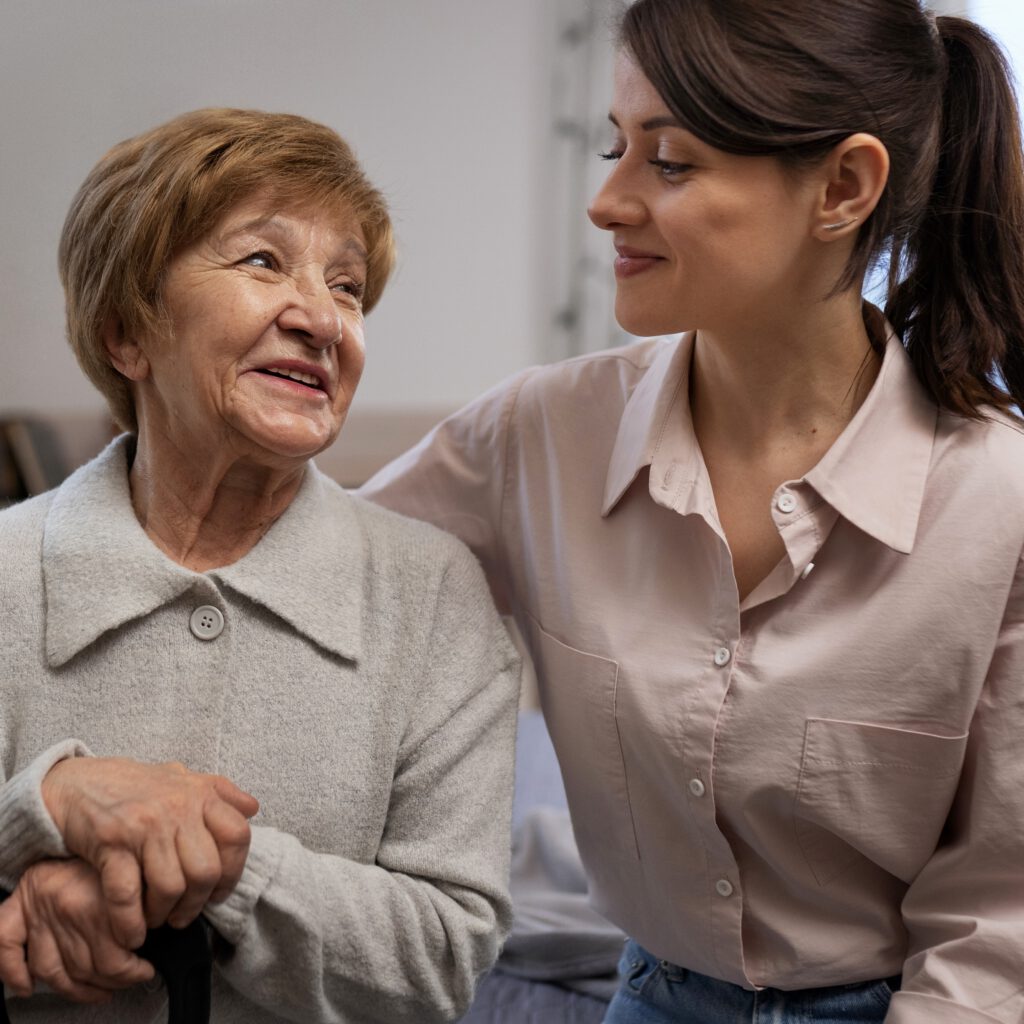 female-nurse-taking-care-elderly-person 2