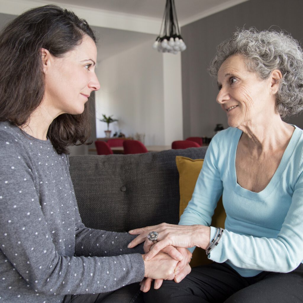 Senior woman and her daughter talking and holding hands. Mother and daughter sitting on couch with home interior in background. Caring for aging parents concept. SSUCv3H4sIAAAAAAAEAJ1Ty67bIBTcV+o/RKyDxNNA/6OrqgtejtF1TGTjVldX+fee2LFDU0VX6s7MGYZhPHx8/XI4IGen5NG3w8dtBevU9/NURltSHgAmxzs+xiHEsUZiSCWPyfY16Gzx3WDPEcBh7vsbfF2GaCq2zFOcqsNsyC5OJfs3APmmQRkfWwDoLppOC+nS5ZJr5tTNpcRxV6hO87bEE9j767ztsj/W9WEbLEPYASOEjhU2zW7BNuh6/O+d68fPzbo9xcG/37xdK9dj7KNdM7p7REFqb0mkmPLIsbDCYWeUxJF520TVGkoY2lW1aINvBebBESy01dhZZ7AyRBAjVOBB7mTDFYmERayotFgESbFumMSCWg6yqhU+LP5X0+jtN2R9XvK827VzSLnK91f2tp+e/sRlTD4Np2pbLt1SpW2bz/NQxvc6Q9TnfLGuv/WoBc244Z2dJqCHDa9/ORQ3n6tzhlyWKO+qKEAnbkvKqZGMMd0ow2nDjUJbRaFIKbysKGKSSEJ4Q9GrbiKmJcgTKdCLlqLvVCjKNRNEo3/eR5eAt2SxOZgvfbYhhgf0bItKSRpttCR7Ax+PCGaKMaLkY/bseeVwxvWD82R6oQgIja6M63652Z0TMD+zZygV/DMLSjTsEwuQLrtbqLJLYYkeFKhoIw6UQ40bprFpgoGXI+HdGMck95D49Q9QfU34+gQAAA==